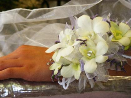 Add a beautiful corsage to your attire for prom or homecoming!  